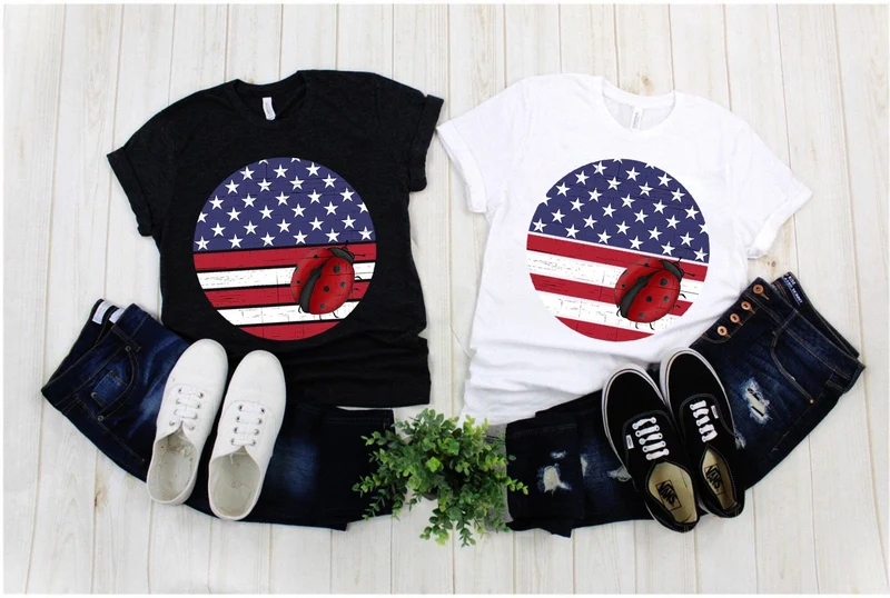 Coccinelle ronde | T-shirts foncés en détresse drapeau américain