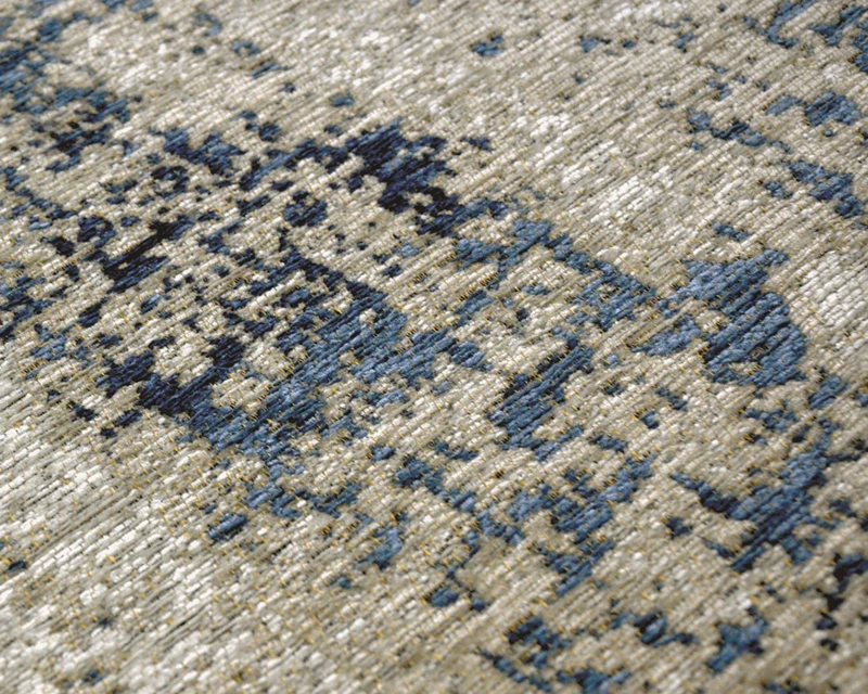 Tapis salon beige tacheté bleu - Antik Cloud