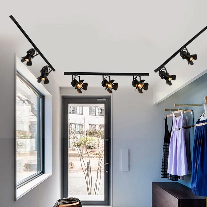Projecteur sur rail triphasé orientable "Cinema" - E27
