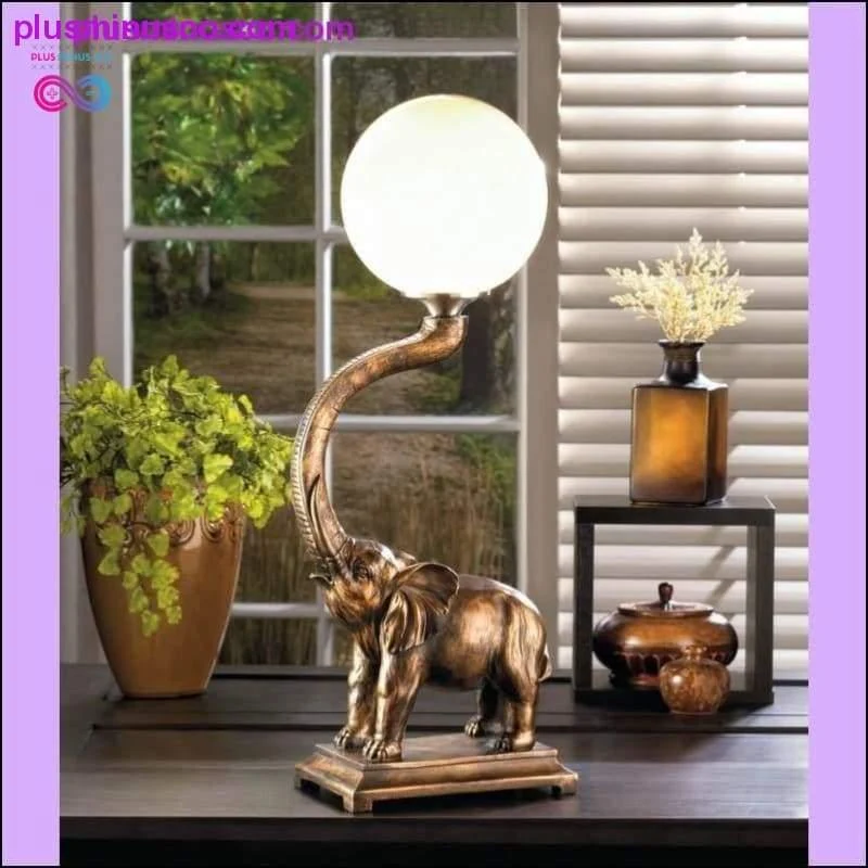Lampe globe éléphant trompette